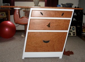 Note the face and that it is leaning. Also note the muscle on the left and the hand holding it up on the right! This is hand made.